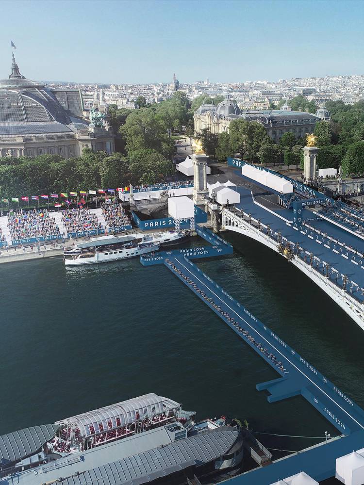 Teste da abertura das Olimpíadas 2024 no Rio Sena, com barcos, arquibancadas e estruturas