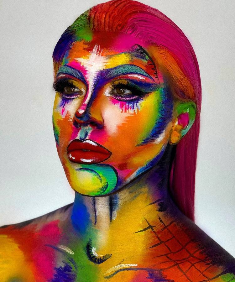 Maquiador Luccas LGBT, com make colorida por todo o corpo