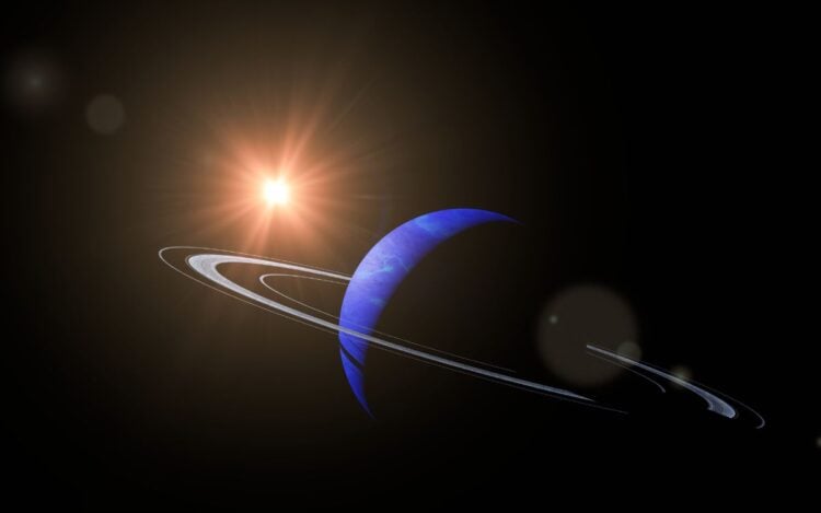Foto de planeta Netuno retrógrado, com seus aneis iluminados pelo Sol
