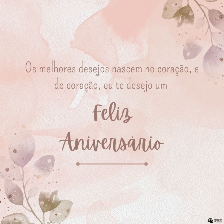 Cartão virtual de fundo rosa antigo com desenhos de ramos e frase "Os melhores desejos nascem no coração, e de coração, eu te desejo um feliz aniversário!"