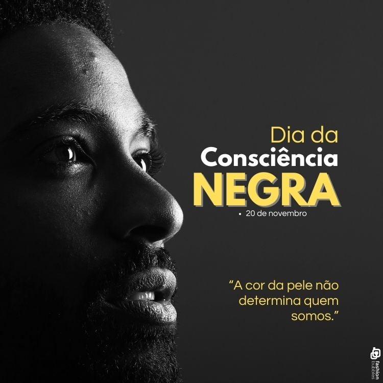 A imagem apresenta o perfil de um homem negro em preto e branco, olhando para cima, simbolizando esperança e reflexão. À direita, em letras amarelas e brancas, lê-se "Dia da Consciência Negra • 20 de novembro". Abaixo, a frase "A cor da pele não determina quem somos" destaca a mensagem de igualdade e identidade.