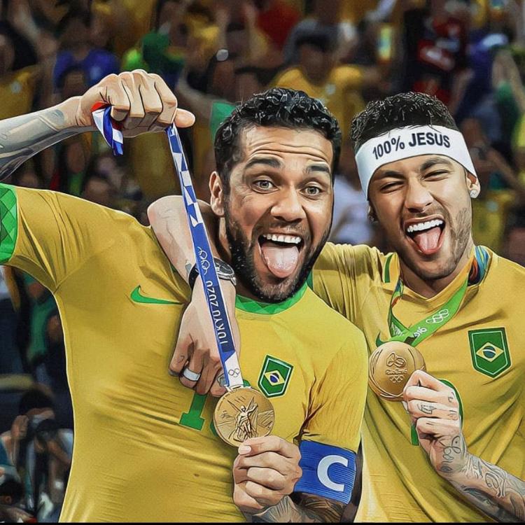 Foto de Daniel Alves e Neymar com a camisa da Seleção Brasileira, comemorando Olimpíadas 2016. Eles ostentam medalha e o camisa 10 usa faixa branca escrito "100% Jesus"