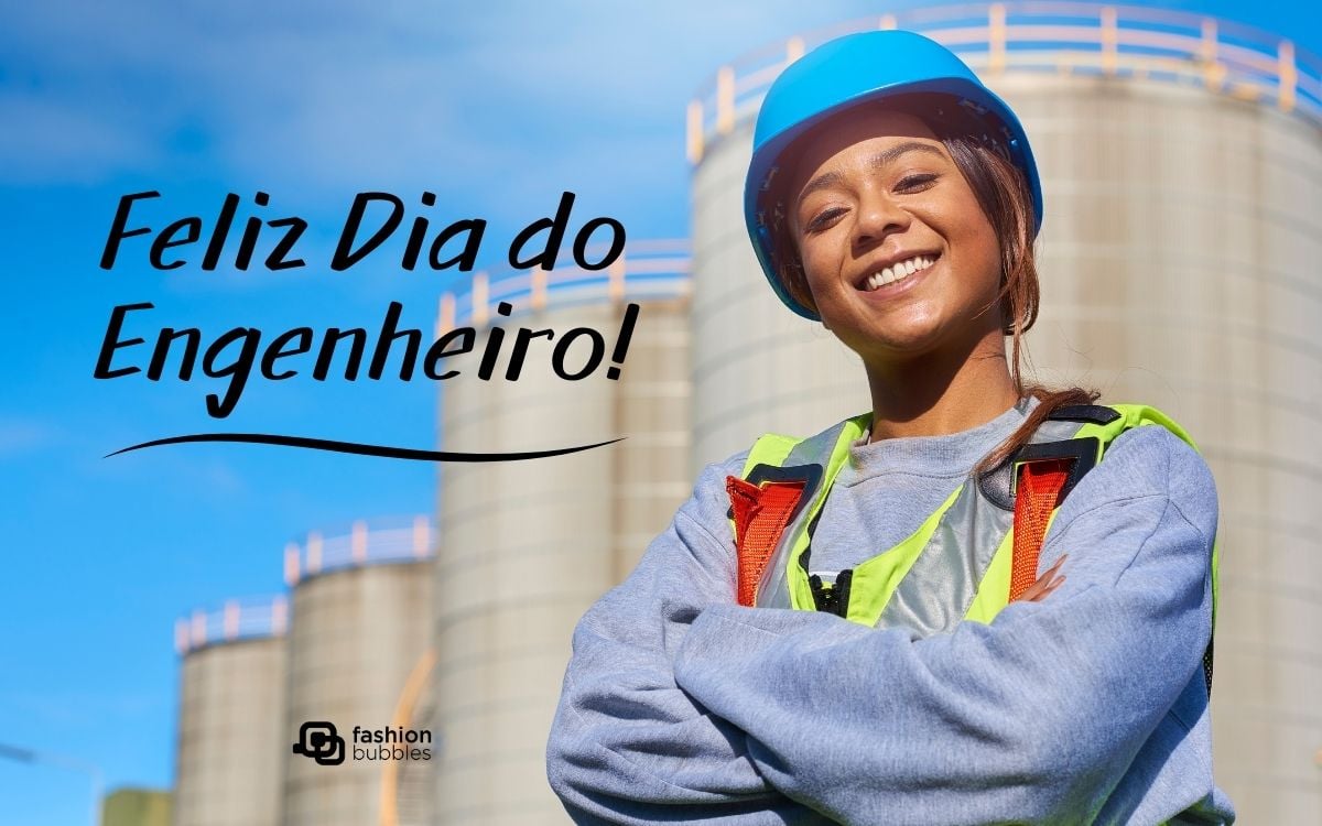 Mulher usando capacete de segurança azul e colete refletor amarelo e laranja. Ao lado, lemos "Feliz Dia do Engenheiro"