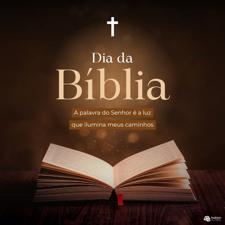 A imagem apresenta uma Bíblia aberta sobre uma superfície escura, destacada por uma luz suave. Acima, um texto diz "Dia da Bíblia". Abaixo, a frase "A palavra do Senhor é a luz que ilumina meus caminhos" expressa espiritualidade e orientação.