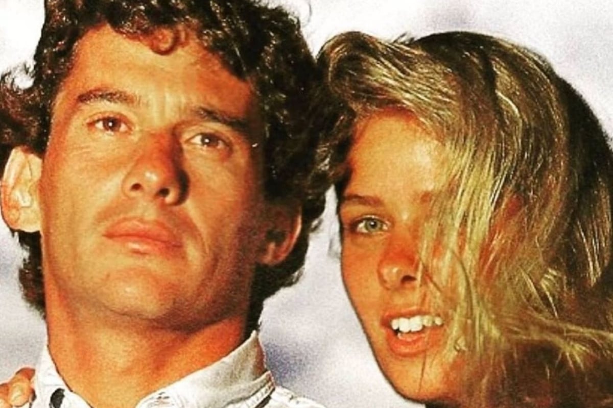 Ayrton Senna e Adriane Galisteu com o rosto um perto do ouro